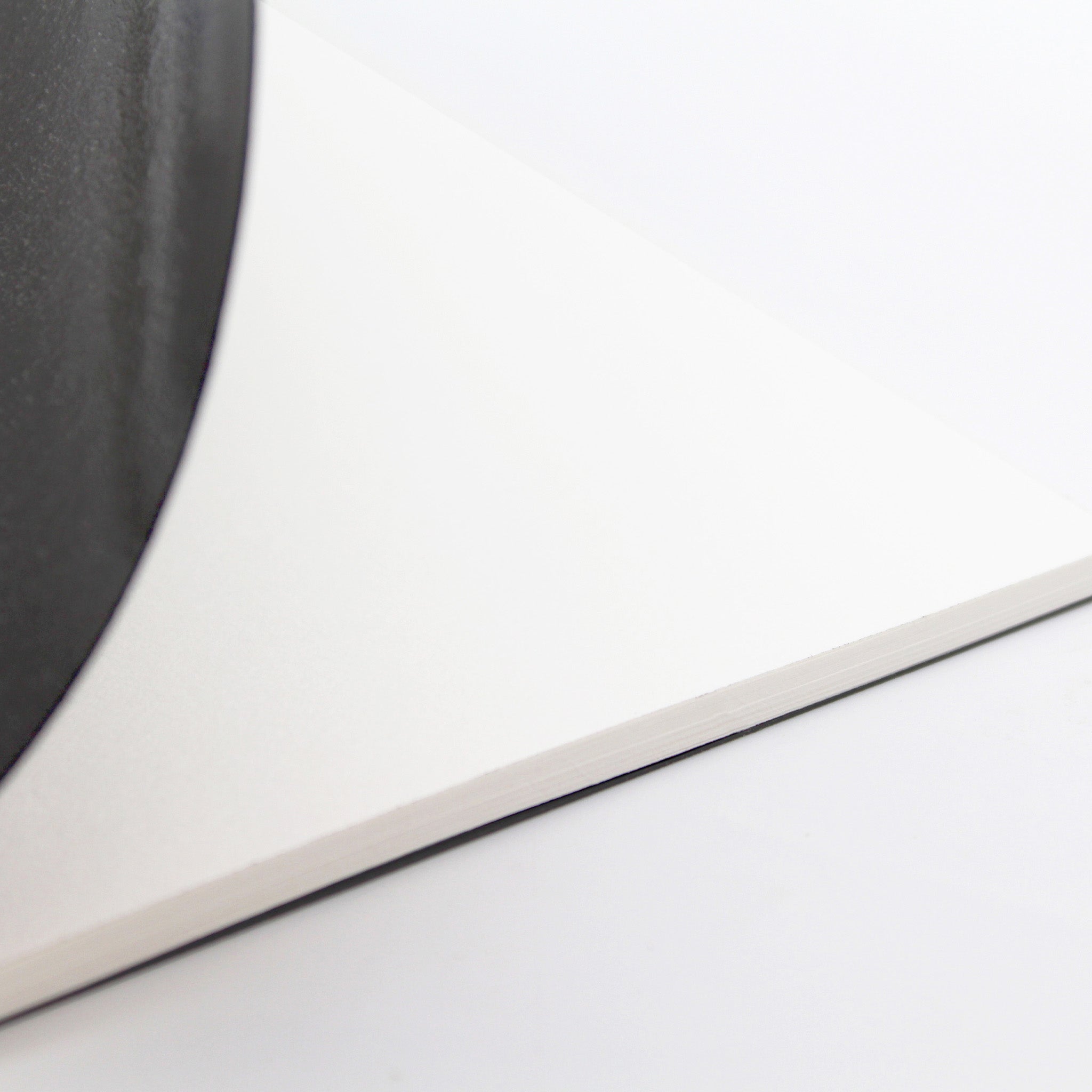 Opened Silvine A4 Field Sketchbook Black Laminated Cover On A White Background