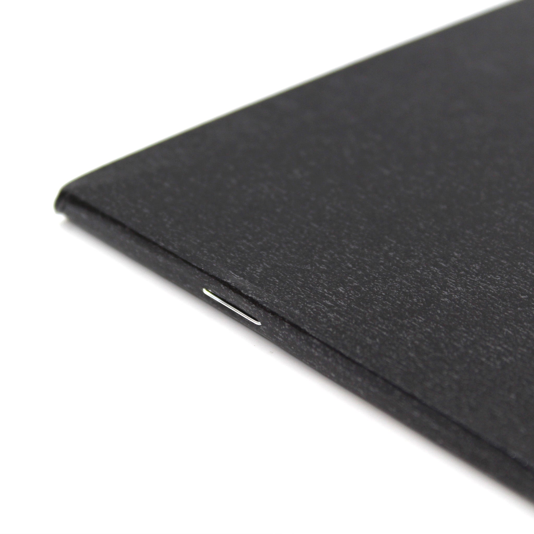 Stapled Silvine A4 Field Sketchbook Black Laminated Cover On A White Background