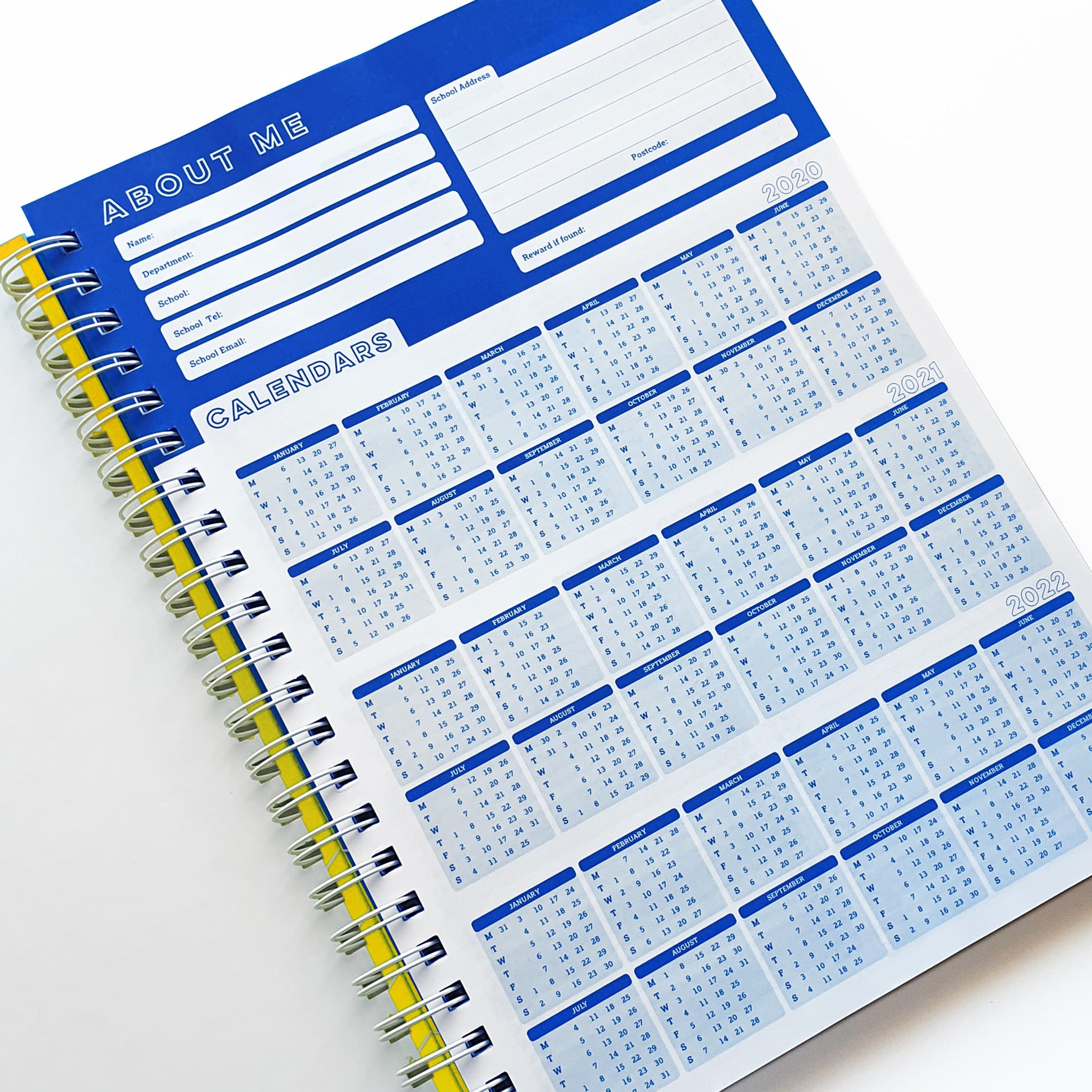Teachers Planner Open On Calendar Planner Page, In A Blue & White Design On A White Background