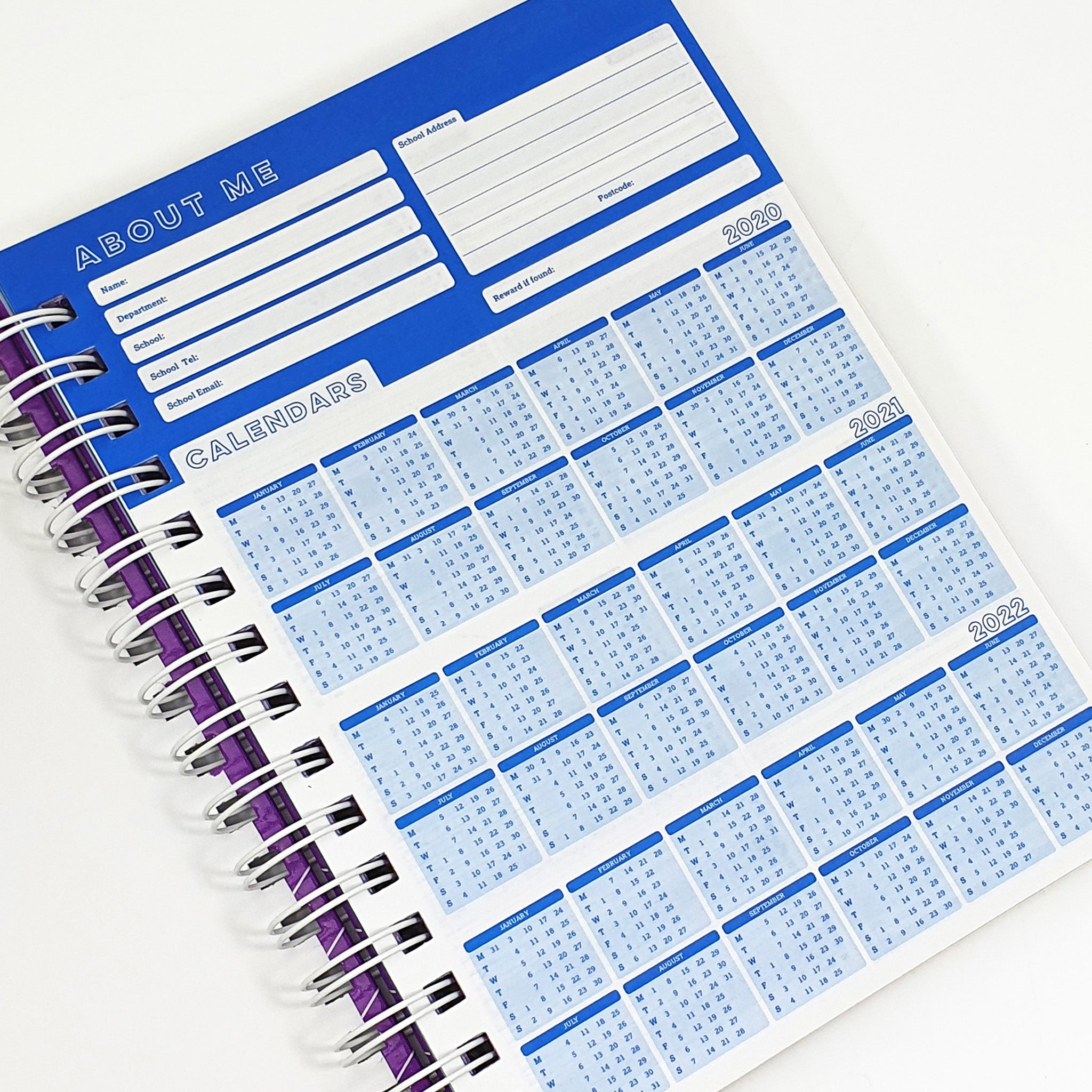 Teachers Planner Open On Calendar Planner Page, In A Blue & White Design On A White Background