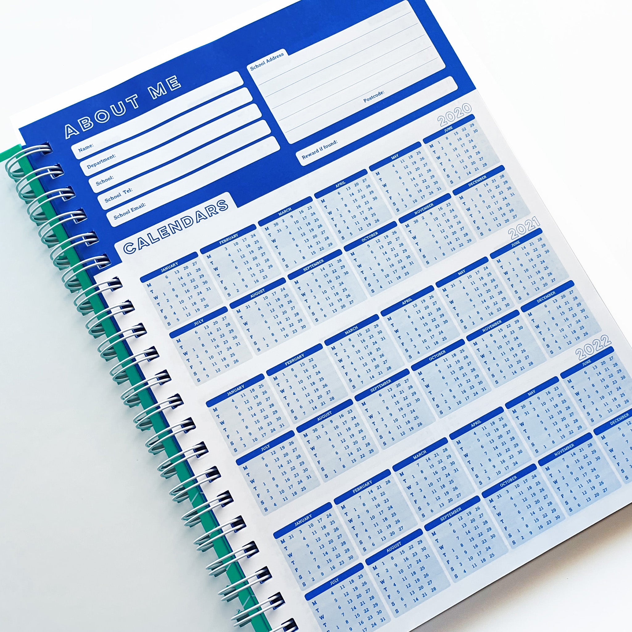 Teachers Planner Open On Calendar Planner Page, In A Blue & White Design On A White Background