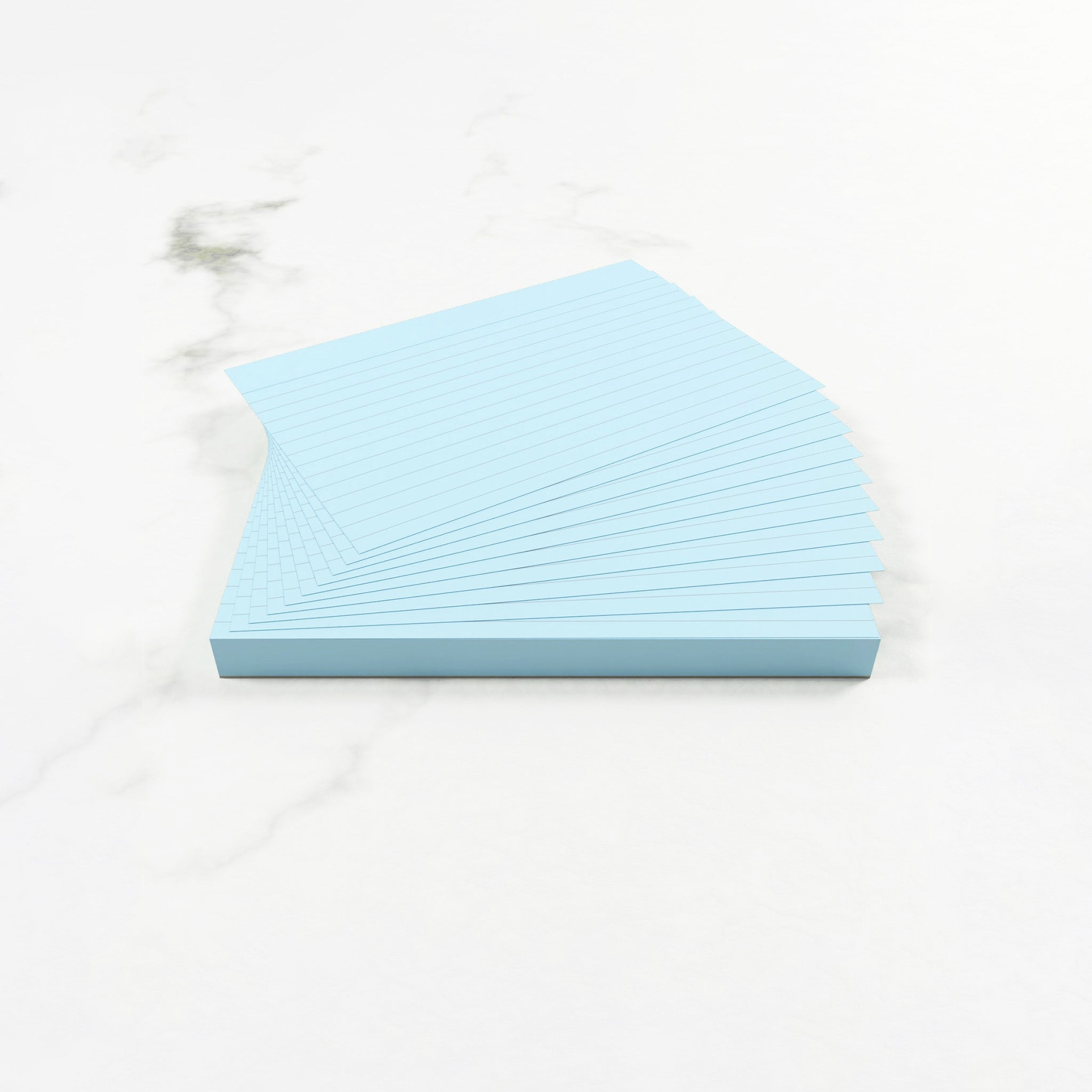 Open Pack Of Lined Silvine Blue Tinted Paper Revision Cards On A White Background