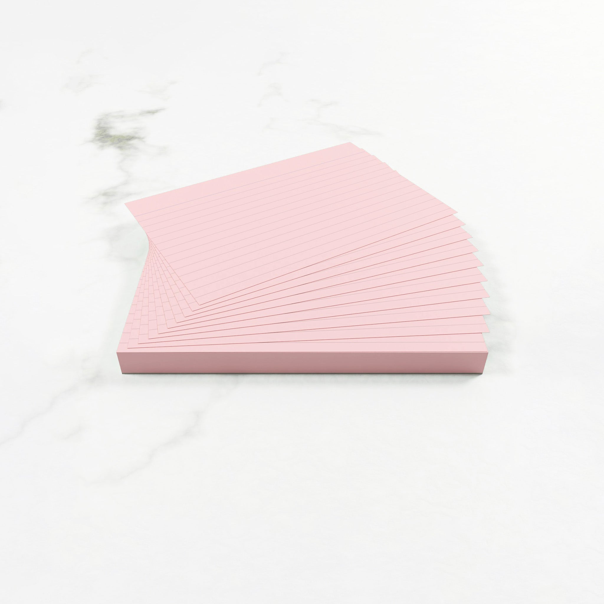 Open Pack Of Lined Silvine Pink Tinted Paper Revision Cards On A White Background