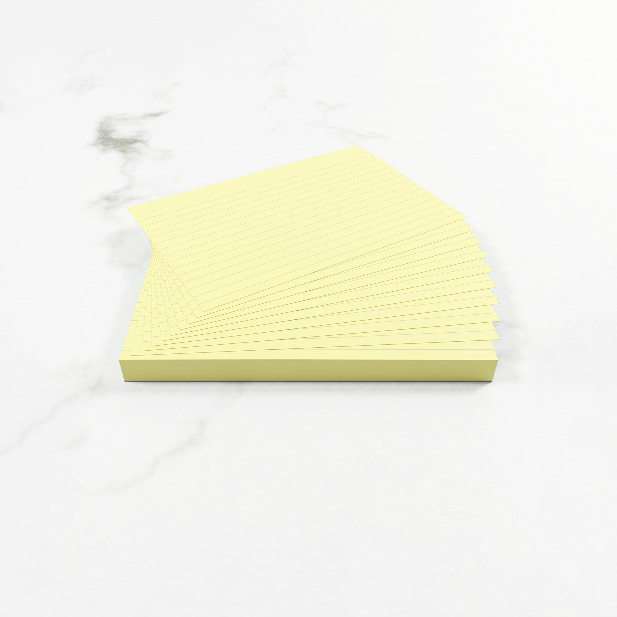 Open Pack Of Lined Silvine Yellow Tinted Paper Revision Cards On A White Background